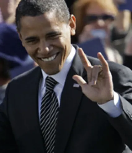 President Barack Obama Flashing The Devil’s Horn Hand Signal.