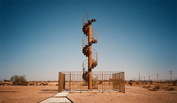 Behind The Chessboard Is A “Staircase To Nowhere” Which Was Originally On The Eiffel Tower.